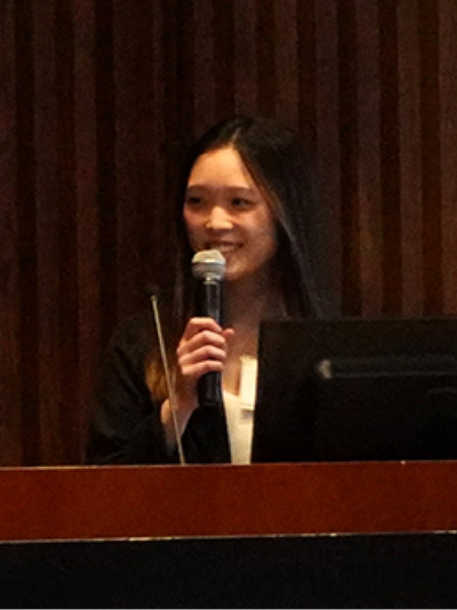 Speaking at the podium